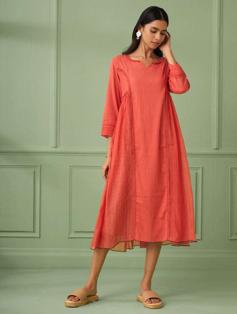 Coral luxury wedding guest dresses for a rich look. Perfect flare dress for bridesmaid and all wedding occasions. This Soft dress comes with a hand block printed slip. Shop or gift the most luxurious and comfortable dress for all occasions.