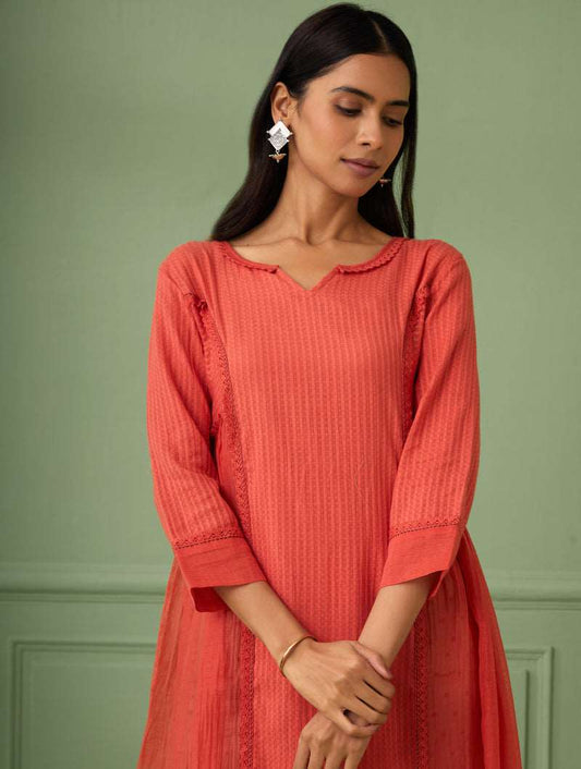 Coral luxury wedding guest dresses for a rich look. Perfect flare dress for bridesmaid and all wedding occasions. This Soft dress comes with a hand block printed slip. Shop or gift the most luxurious and comfortable dress for all occasions.