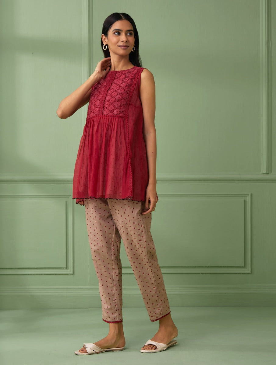 Buy lace red top with round neck made from pure cotton fabric. Perfect gift for mom, wife and all loved ones. comfortable and flared sleeveless top for summer comes with a polka dot slip and adjustable pants