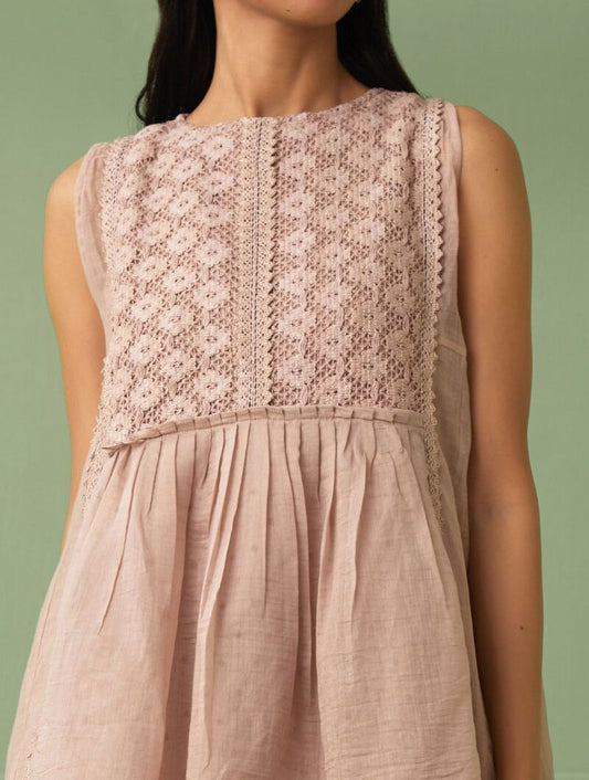 shop rose top with round neck and lace details made from pure cotton fabric. Perfect gift for loved ones. comfortable and flared top for summer