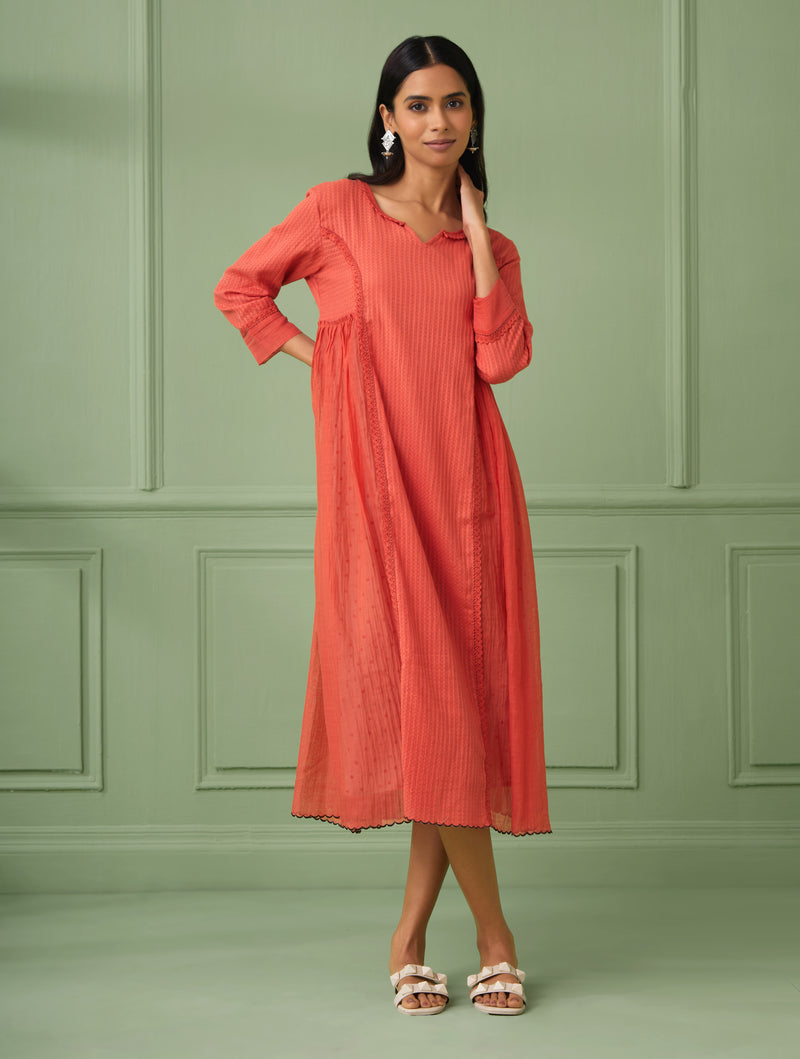 Coral luxury wedding guest dresses for a rich look. Perfect flare dress for bridesmaid and all wedding occasions. This Soft dress comes with a hand block printed slip. Shop or gift the most luxurious and comfortable dress for all occasions.