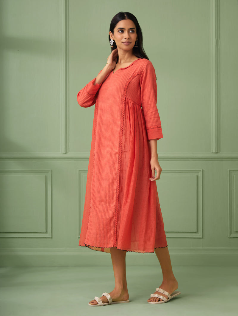 Coral luxury wedding guest dresses for a rich look. Perfect flare dress for bridesmaid and all wedding occasions. This Soft dress comes with a hand block printed slip. Shop or gift the most luxurious and comfortable dress for all occasions.