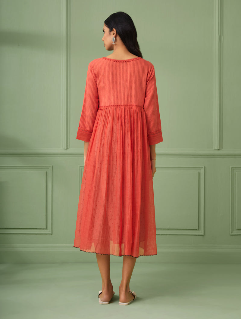 Coral luxury wedding guest dresses for a rich look. Perfect flare dress for bridesmaid and all wedding occasions. This Soft dress comes with a hand block printed slip. Shop or gift the most luxurious and comfortable dress for all occasions.
