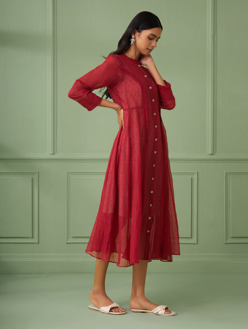 This jacket dress is ideal for parties and housewarmings, a calf-length design with sophistication. This Indo western dress makes for a perfect gift for your loved ones. It comes with a comfortable slip dress that is hand block printed with polka dots. The dress is beautifully adorned with intricate hand stitches and delicate ruffles.