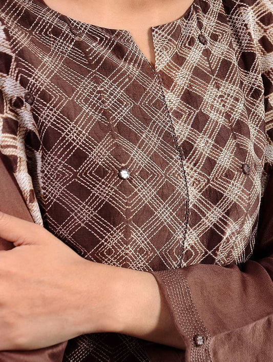 Silk chanderi with detailed symmetric pattern, embellished with mirror work and golden stitches on the sleeves, COD available in India