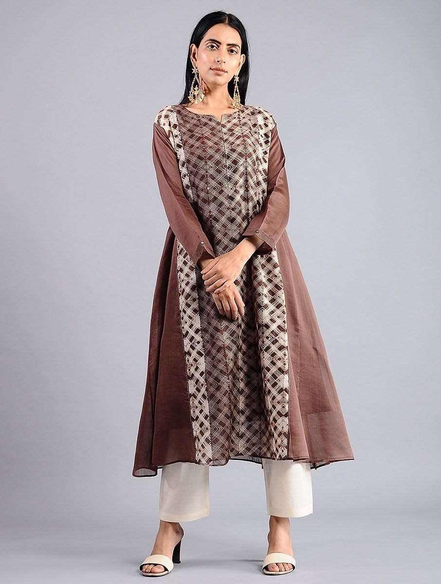 Detailed shibori, machine tritic, Sonal Kabra, natural fabric, sustainable, artisan made, premium luxury, solid brown sleeves, delivered worldwide