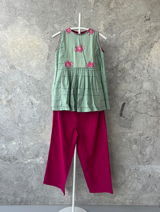 Pista sleeveless rayon top with floral yoke and scalloped edges by Sonal Kabra