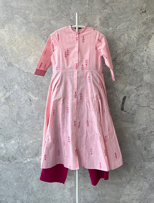 Pink cotton jacket dress with princess line, side kalis, 3/4 sleeves, and ruffle neckline by Sonal Kabra, breathable summer wear.