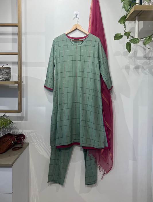 Pista green rayon kurta with pink piping and checked fabric by Indian designer Sonal Kabra
