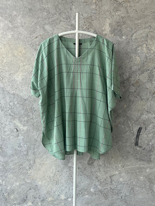 Pista green checked rayon kaftan top with V-neck by Indian designer Sonal Kabra