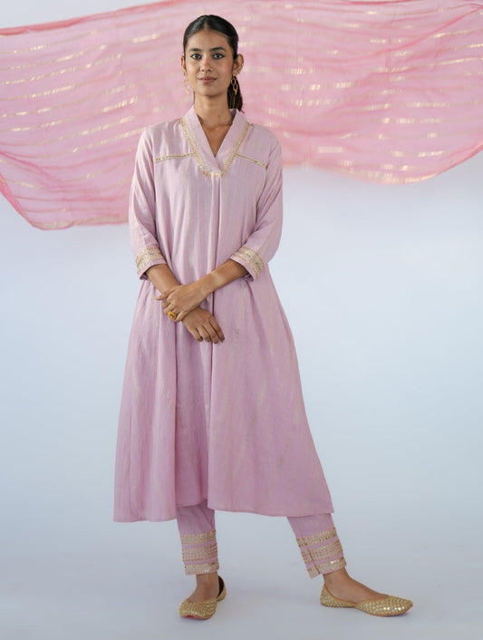 "Vintage Rose Umbrella-Cut Kurta Set by Sonal Kabra in cotton with silver zari, featuring golden thread and sequin work, red bead detailing, and cigarette pants."