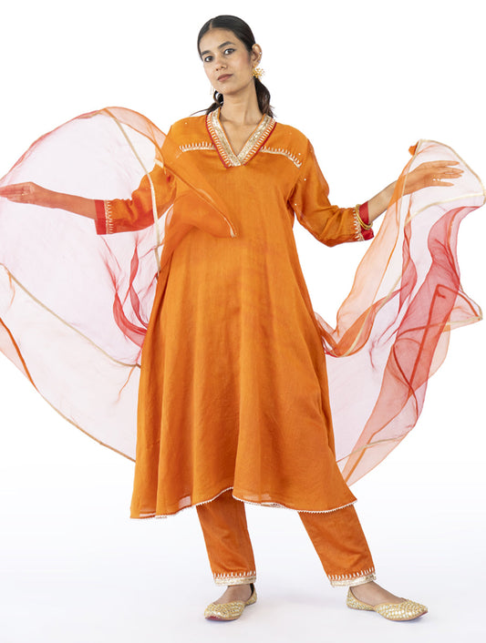 Orange Chanderi flared kurta set with zardosi embroidery, side pockets, and embroidered pants – handcrafted Indian designer wear by Sonal Kabra.