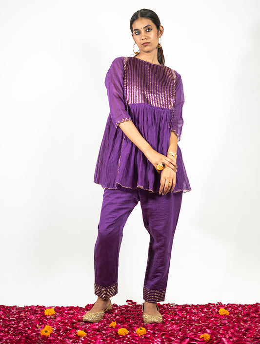 Purple Chanderi frock set with tikki, zardozi, and aari hand embroidery by Indian designer Sonal Kabra ? festive three-piece outfit from the Virasat collection.