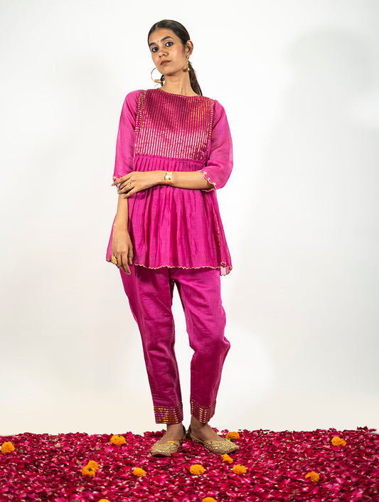 Rani pink Chanderi frock set by Indian designer Sonal Kabra with tikki, zardozi, and aari handwork; festive three-piece set from the Virasat collection.