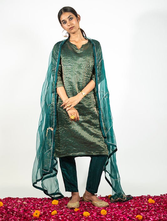 Green Chanderi kurta set with beadwork and silk pants by Indian designer Sonal Kabra