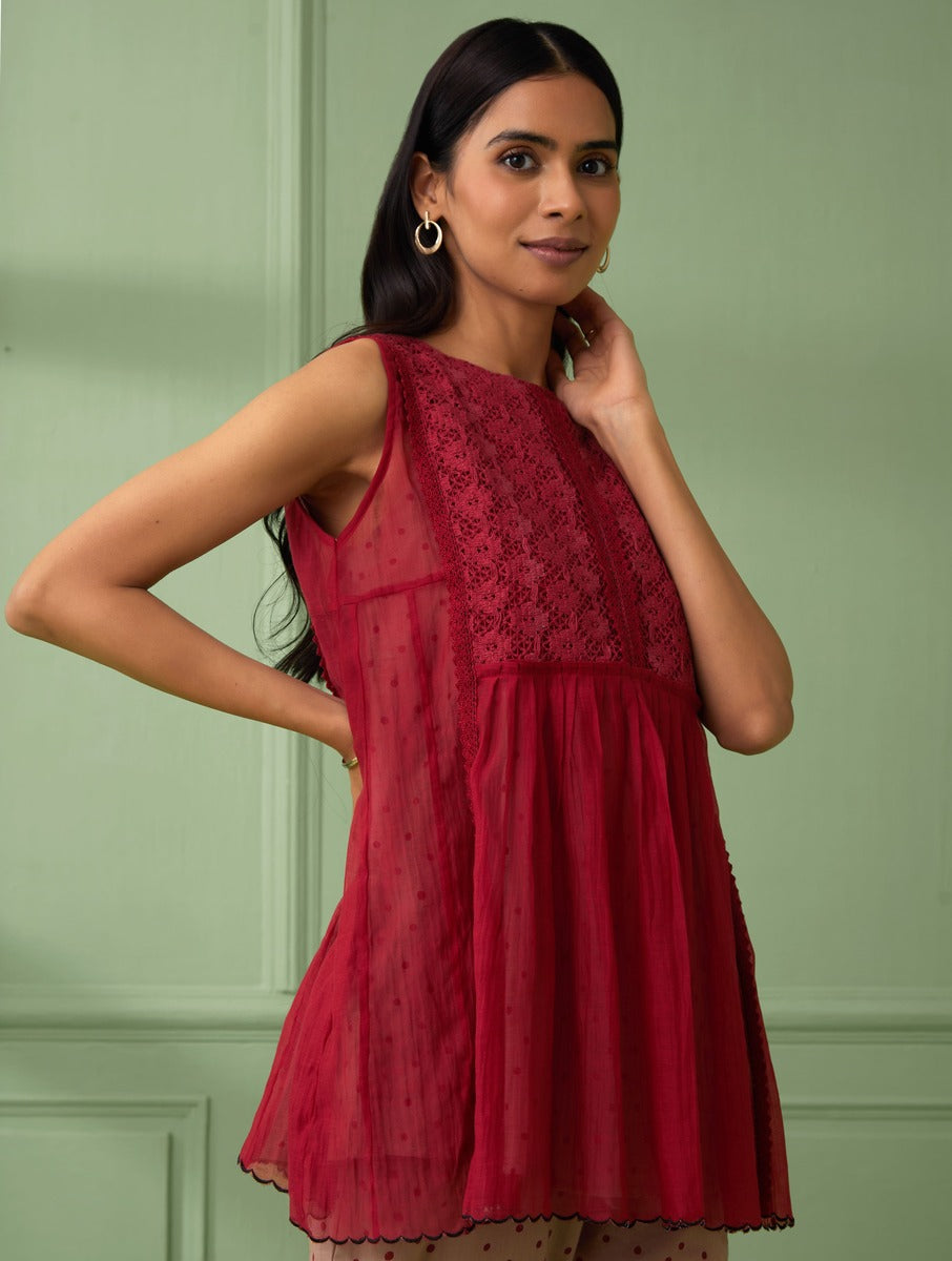 Buy lace red top with round neck made from pure cotton fabric. Perfect gift for mom, wife and all loved ones. comfortable and flared sleeveless top for summer comes with a polka dot slip and adjustable pants