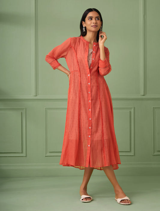 Elegant calf length jacket dress from parties and housewarmings. Indian traditional dress perfect to gift for loved one. Comes with a hand block printed slip dress with polka dots. Beautiful hand stitches and ruffles to add up to the elegance.