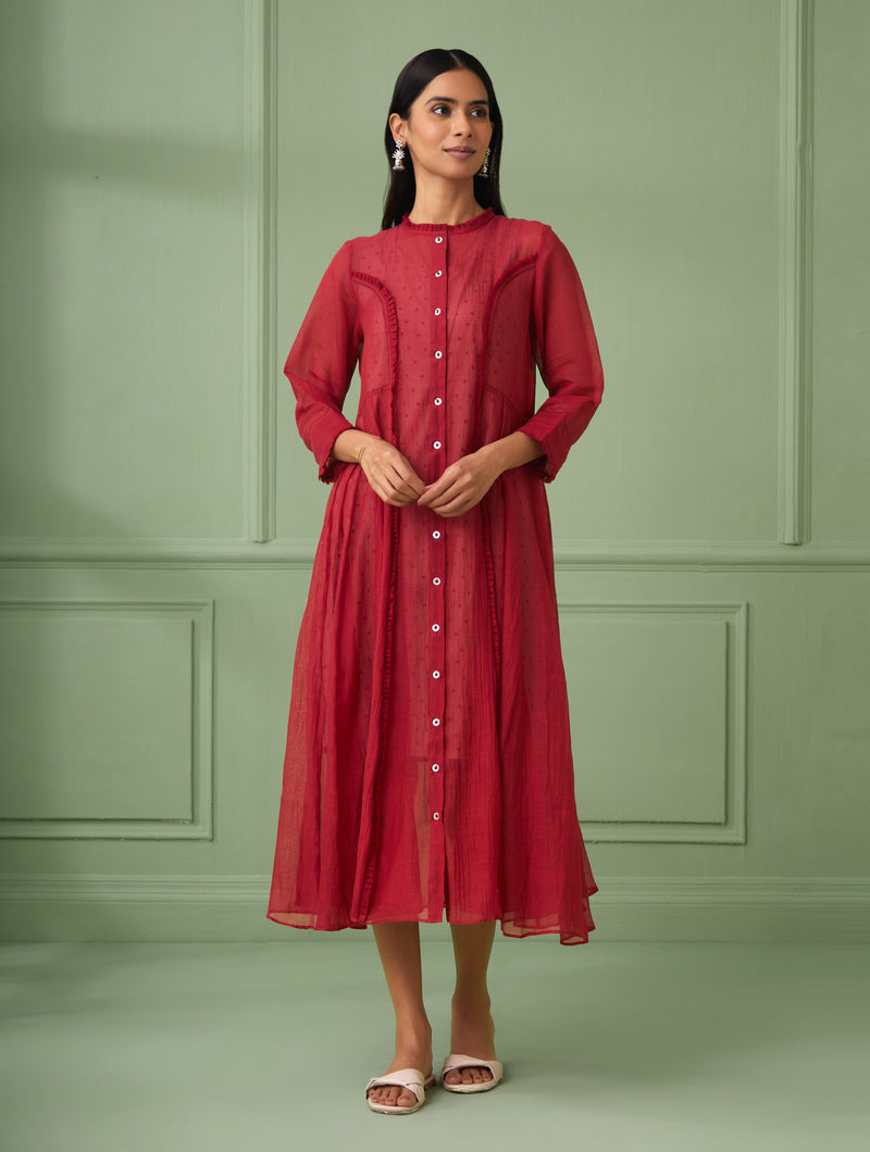 This jacket dress is ideal for parties and housewarmings, a calf-length design with sophistication. This Indo western dress makes for a perfect gift for your loved ones. It comes with a comfortable slip dress that is hand block printed with polka dots. The dress is beautifully adorned with intricate hand stitches and delicate ruffles.