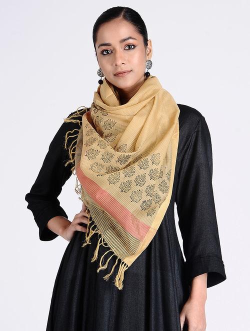 Plain beige stole with elegant black motif on the opposite sides, vertical stripped black and red border, knotted ends, goes with any garment, good crease recovery 