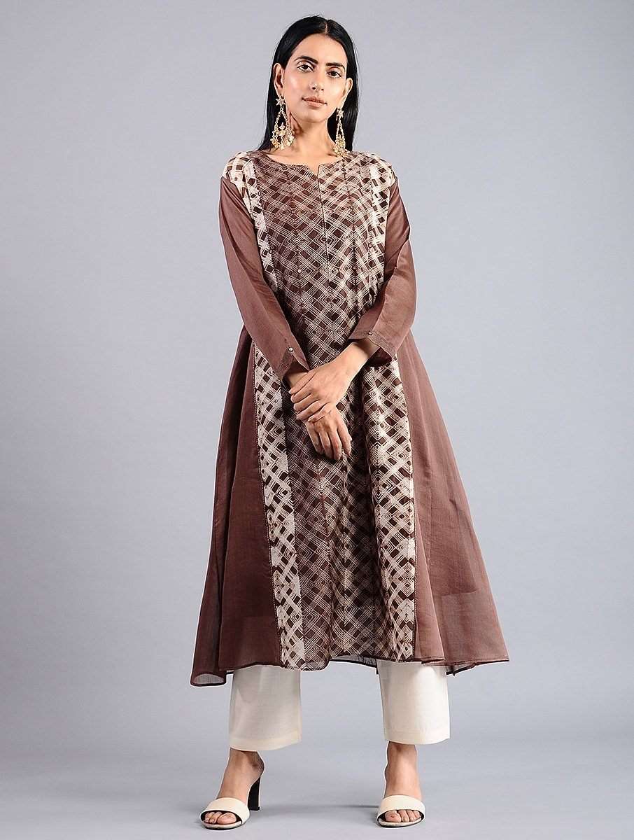 Detailed shibori, machine tritic, Sonal Kabra, natural fabric, sustainable, artisan made, premium luxury, solid brown sleeves, delivered worldwide 