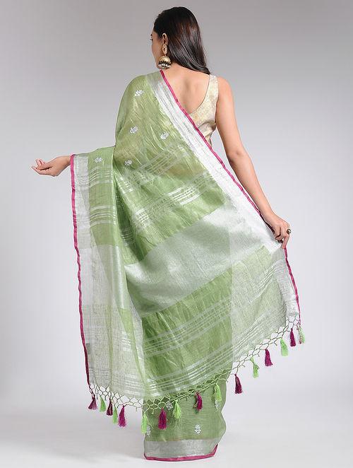Combination of pinnk green and silver with broad and thin strips of silver on pallu with knotted jali and green pink tassels, with Unstitched bloude piece
