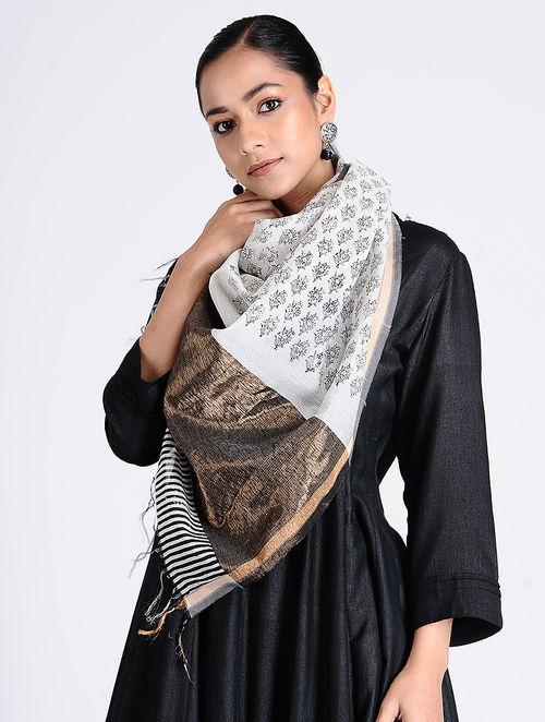 Sustainable coton silk ivory fabric stole with small stylised floral motifs, throughout print, copper black border, breezy fabric, Hand wash in cold water recommended, The Neem Tree, Sonal Kabra