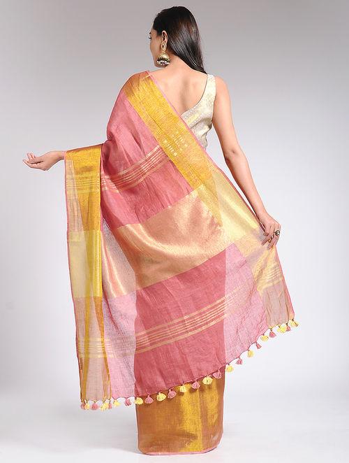 Minimal zari detailing on the pallu with yellow and pink tassels, dry cleaning recommended unstitched blouse , purchase online on the sonal kabra website